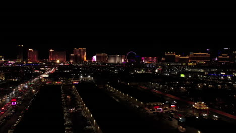 Las-Vegas-USA,-Aerial-View-of-Cityscape-Skyline-at-Night,-Street-Traffic-and-Lights-on-Casino-Hotels