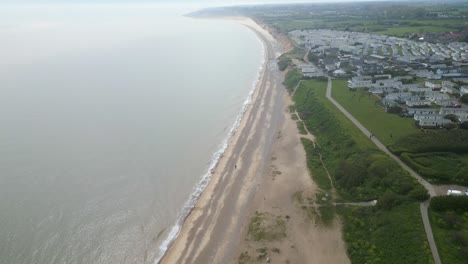 Moving-drone-view-of-Pakefield-Beach-in-Suffolk,-England,-UK