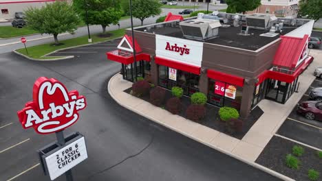 Aerial-approaching-shot-of-Arby’s-restaurant-in-America-town
