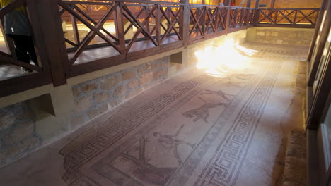 A-closer-view-of-the-intricate-ancient-mosaics-on-the-floor-of-the-House-of-Dionysus,-seen-from-the-walkway-above