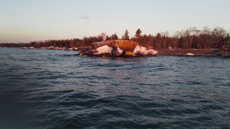 Panoramic-aerial-view-coast-of-the-Lake-Superior-at-sunset-in-Hollow-Rock