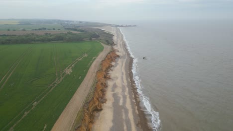 Drone-shot-of-Kessingland-Beach-under-a-cloudy-day-in-Suffolk,-England