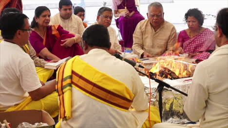 Offerings-are-made-to-Hindu-deity,-Ganesh,-seen-in-slow-motion