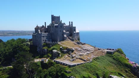 High-quality-shot,-aerial-view-of-the-island-of-St-Michael`s-Mount,-view-of-the-15th-century-chapel-in-Cornwall-part-2