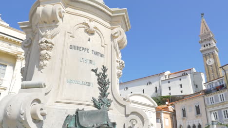 Tatrini-square-in-Slovenia-at-Piran-with-church-behind-in-slow-motion