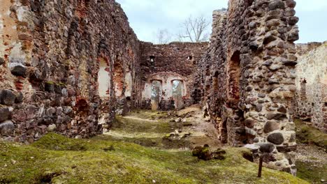 Aerial-panoramic-Rauna-castle-ruins-in-Latvia-european-remaining-heritage-sky