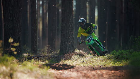 Motocross-rider-racing-through-the-wild-forest-on-off-road-trail