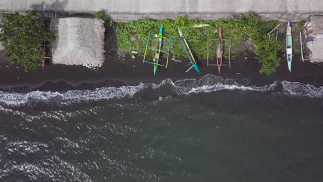 Parked-Boat-Along-The-Shoreline-in-Slow-Motion