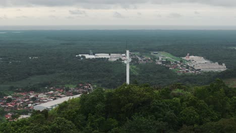 Aerial-view-of-storage-structures-in-port-of-São-Francisco-do-Sul,-Morro-da-Cruz-in-the-foreground,-Santa-Catarina,-Brazil