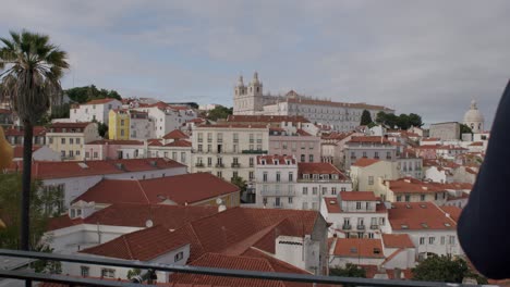 Shot-of-Alfama,-the-oldest-district-of-the-Old-Town,-with-National-Pantheon-from-belvedere-Miradouro-das-Portas-do-Sol-in-Lisbon,-Portugal
