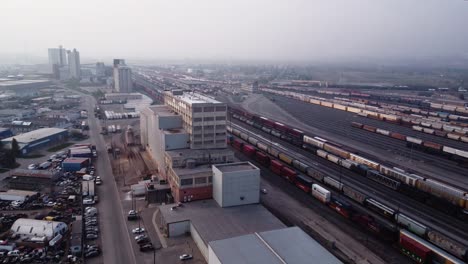 Drone-shot-of-a-railroad-transport-hub-in-Calgary,-Alberta