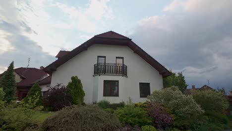 The-property-of-a-family-house-surrounded-by-a-mature-garden-with-bushes