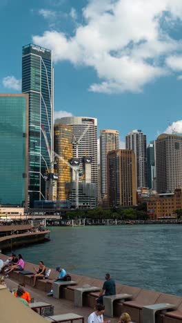 Vertical-4k-Timelapse,-Sydney-Australia-City-Harbor,-Cruise-Ship-Terminal,-Ferry-Line-Boats-and-People-on-Sunny-Day