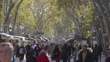 Crowd-Of-People-Walking-On-La-Rambla-Central-Street-In-Barcelona-City