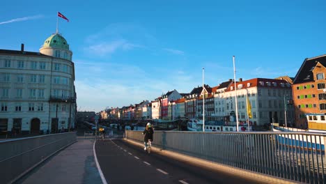 Cycling-road-over-the-Inderhavnsbroen-bridge-near-famous-crowded-touristic-attraction-Nyhavn-in-Copenhagen,-Denmark