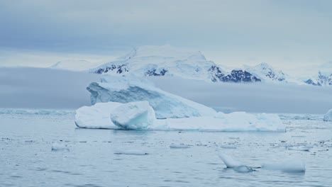 Antarctica-Iceberg-Mountains-and-Ocean,-Beautiful-Dramatic-Blue-Coastal-Landscape-and-Seascape-on-Antarctic-Peninsula-Coast,-Icy-Winter-Sea-Scene-with-Ice