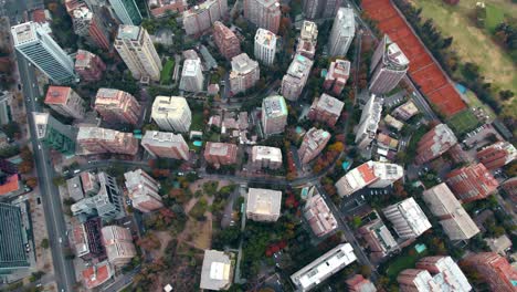 High-buildings-neighborhood-establishing-shot-urban-green-area-around-top-aerial