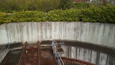 Flyover-of-a-train-turntable-at-Whitehead-Railway-Museum,-Northern-Ireland