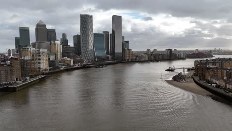 Canary-Wharf-financial-district-London-UK-drone-aerial-view-over-river-Thames