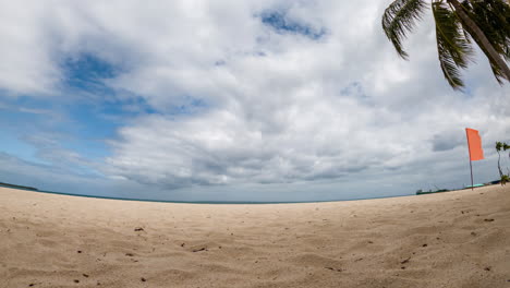 Time-lapse-on-Philippines-beach-on-cloudy-day,-fisheye-effect