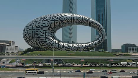 A-stunning-view-of-Dubai's-Museum-of-the-Future,-along-with-Sheikh-Zayed-Road-and-city-traffic