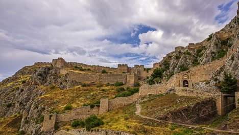 The-walls-of-fortress-hill-of-Chlemoutsi-or-Clermont-Castle---dramatic-time-lapse