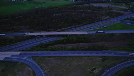 Overview-aerial-of-I-80-Interstate-in-Pennsylvania,-catering-to-semi-truck-logistics