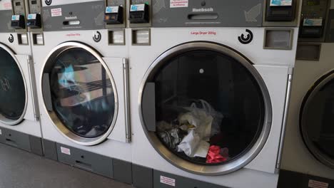 Static-view-of-large-washing-machine-at-laundromat-in-New-Zealand