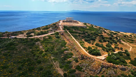Temple-of-Poseidon-Ruins-At-Cape-Sounion-With-Myrtoan-Sea-In-Greece