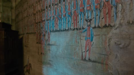 Military-themed-wall-painting-in-the-Wall-Paintings-Room-of-Trakošćan-Castle-,-Croatia,-featuring-soldiers-in-uniform