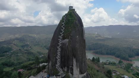 Tilt-up-shot-of-La-Piedra-del-Peñol-Guatapé-Rock