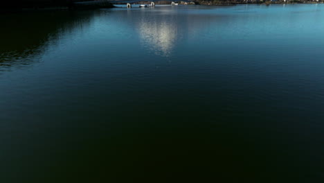 Lake-Kawaguchiko-Reveals-Mount-Fuji-In-Japan