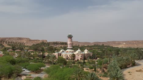 Aerial-view-towards-the-Neot-Semadar-Art-center,-in-Israel---establishing,-drone-shot