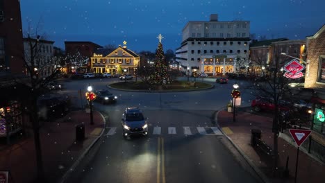 Snow-flurries-in-quaint-USA-town-during-Christmas-Eve-night