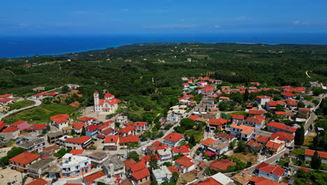 Chlemoutsi-Castle-Museum-aerial-Greek-village,-houses-with-orange-roof-tiles