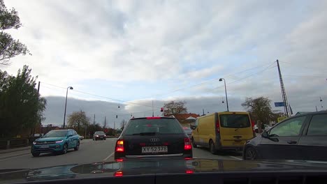 POV-Driving-view-car-through-cloudy-weather-in-central-area-in-Copenhagen,-Denmark