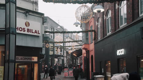 Aarhus-city-pedestrian-mall-christmas-time-shopping-street-winter-cloudy-foggy-moody