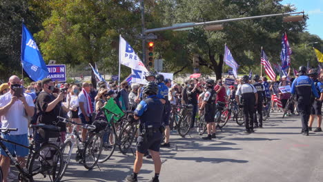 Police-officers-control-crowds-gather-in-downtown-Austin,-TX-after-Biden-victory-over-Trump-announced-in-2020-US-Presidential-Election