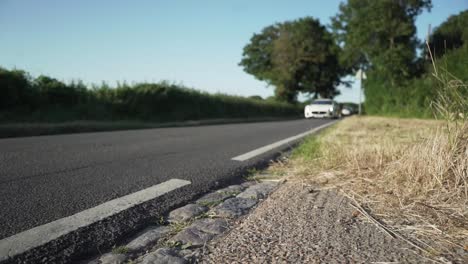 Maserati-GranTurismo-driving-by-slowly