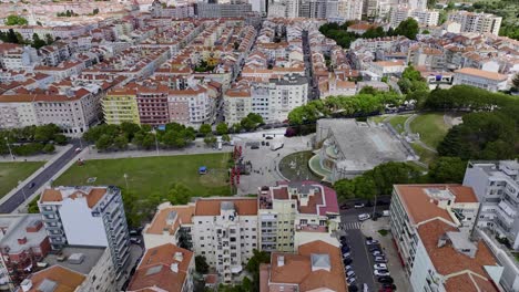 Drone-shot-backing-out-and-turning-from-Fonte-Luminosa-at-Alameda-in-Lisbon