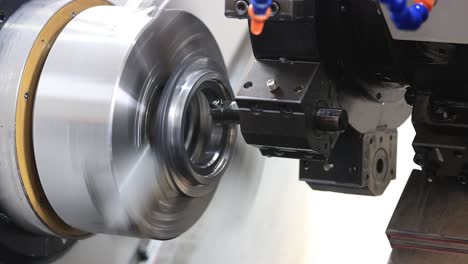 extreme-close-up-seen-High-quality-CNC-and-VMC-high-drilling-is-being-done,-Industrial-safety-first-concept