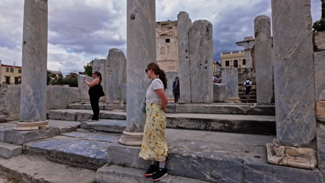 Travelers-At-The-Ruins-Of-The-Roman-Forum-of-Athens-In-Athens,-Greece