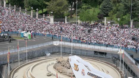 Thousands-of-Real-Madrid-fans-gathered-at-Cibeles-Square-to-celebrate-the-36th-Spanish-football-league-title-trophy,-La-Liga-championship,-in-Madrid,-Spain