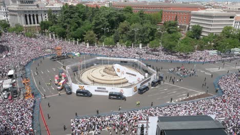 Real-Madrid-fans-gathered-at-Cibeles-Square-to-celebrate-the-36th-Spanish-soccer-league-title,-La-Liga-championship,-in-Madrid,-Spain