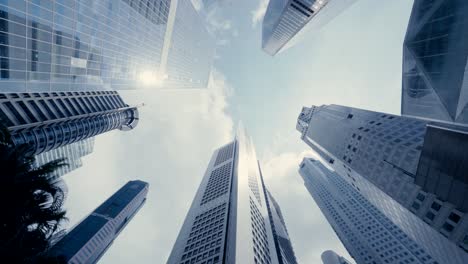 Abstract-slow-motion-looking-up-driving-through-the-business-district-in-Singapore