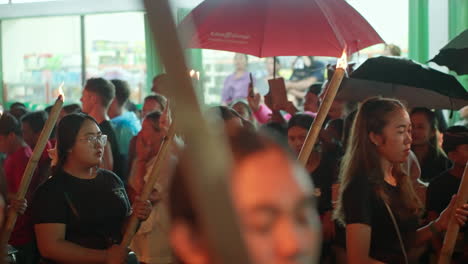 Large-group-of-young-females-attending-parade-celebrations,-city-location