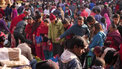 Elevated-shot-of-a-busy-market-in-a-town-square,-Bhaktapur,-Kathmandu-Valley,-Nepal