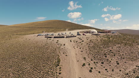 Aerial-image-of-the-Mirador-of-Cerro-de-los-14-Colores,-known-as-Hornocal,-on-a-sunny-day-with-few-tourists,-situated-4300-meters-above-sea-level