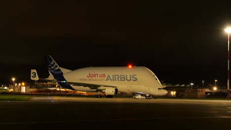 Saint-Nazaire,-Beluga-Airbus-International-Airplane-At-Night-In-France