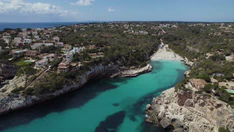 Aerial-of-Cala-Llombards-Beach-Cove-Lagoon-on-Mallorca-Island-Coast